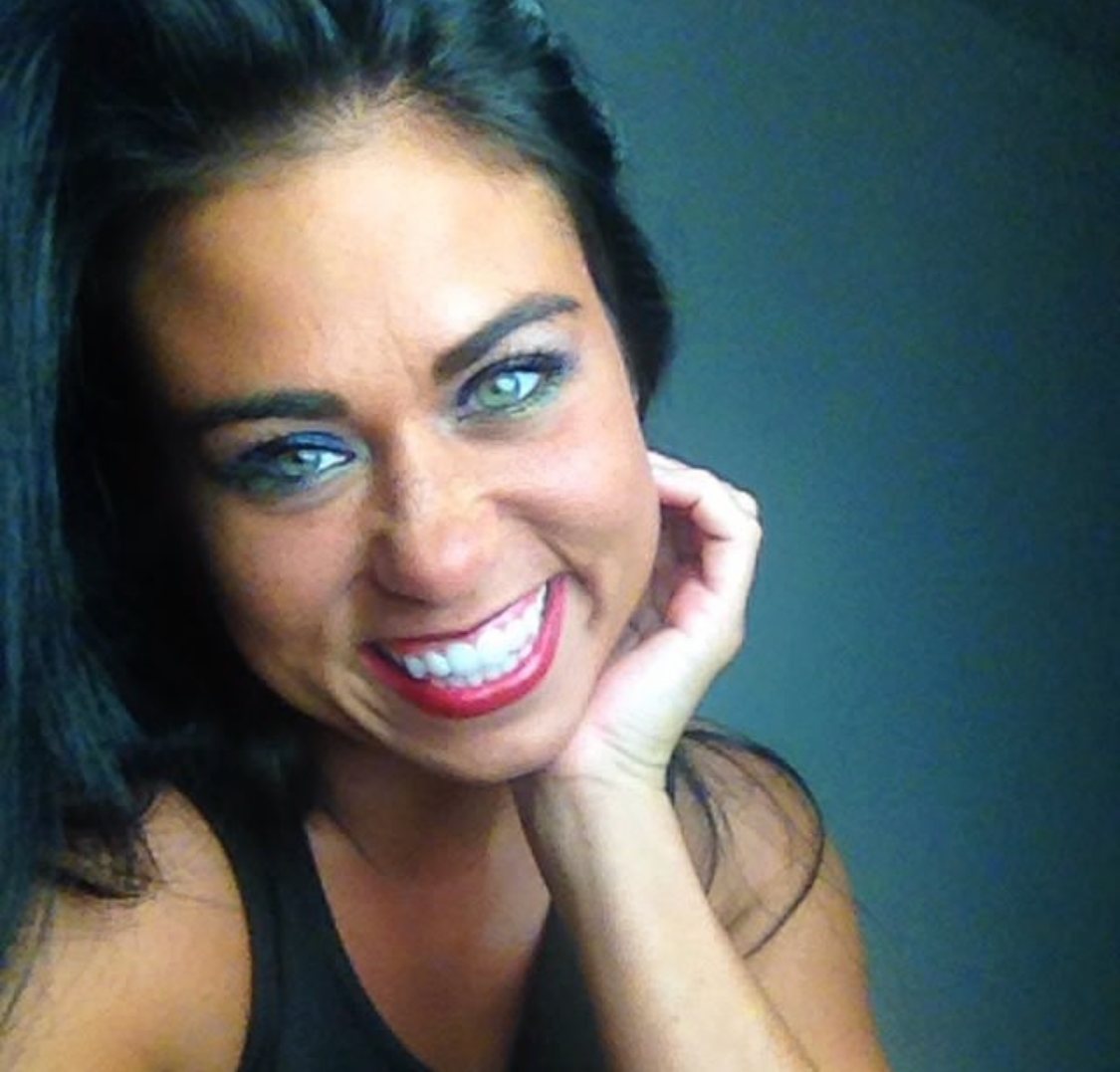 Natalie Nicole smiling in a portrait