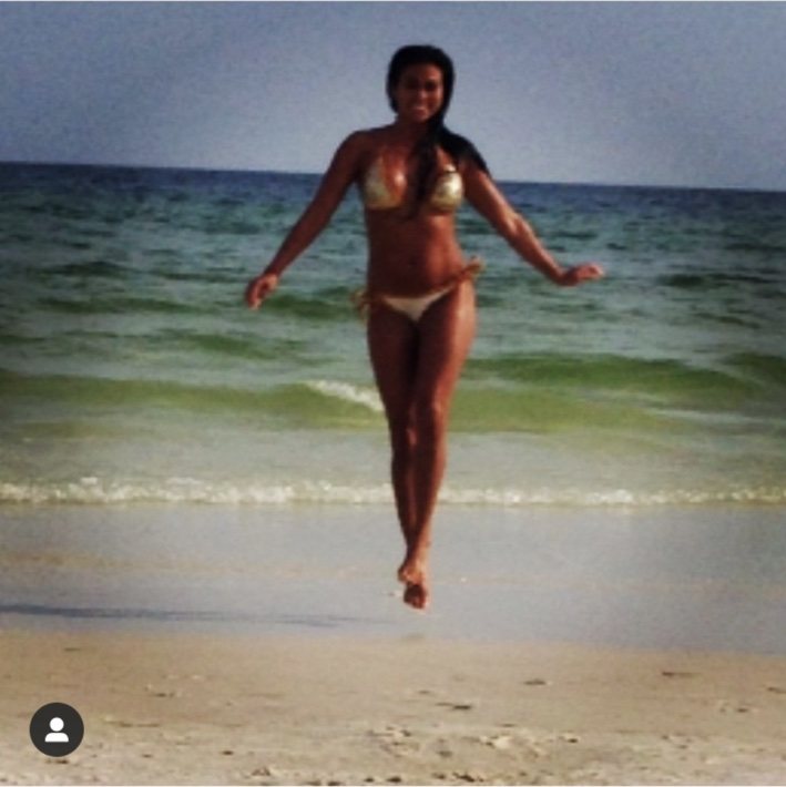 Natalie Nicole walking on the beach
